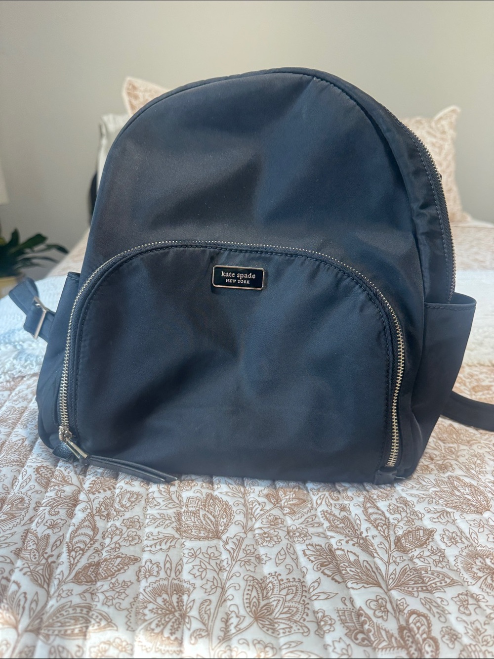 kate spade navy black nylon backpack with gold-tone accents